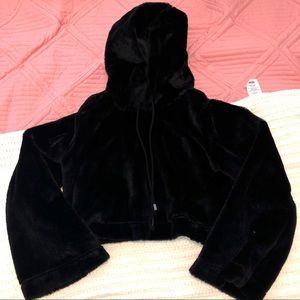 fuzzy black cropped hoodie.
